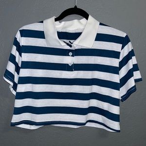 It is some what see through, striped blue and white crop top. Size M